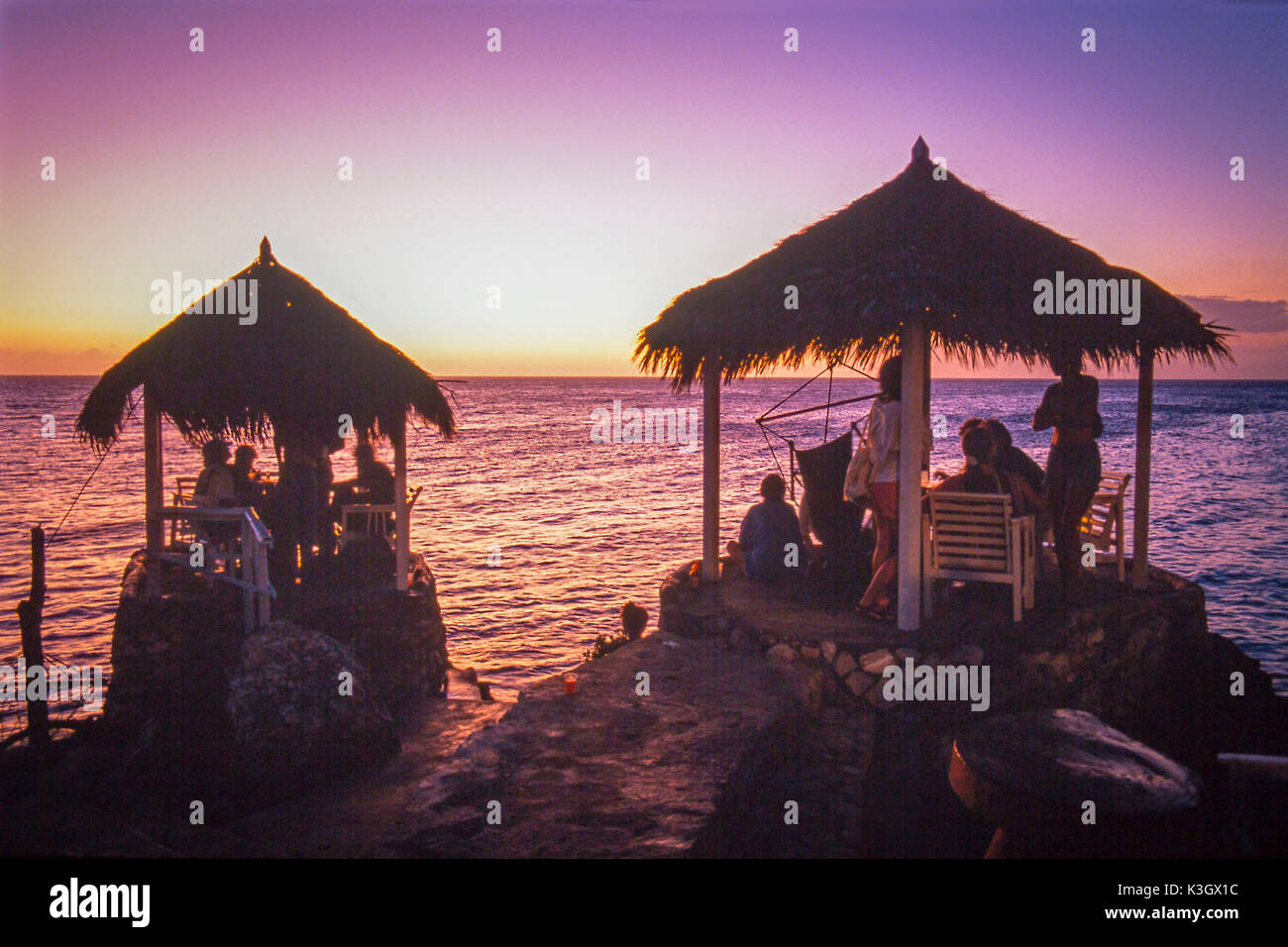 Sundown by the sea in Negril, Jamaica Stock Photo