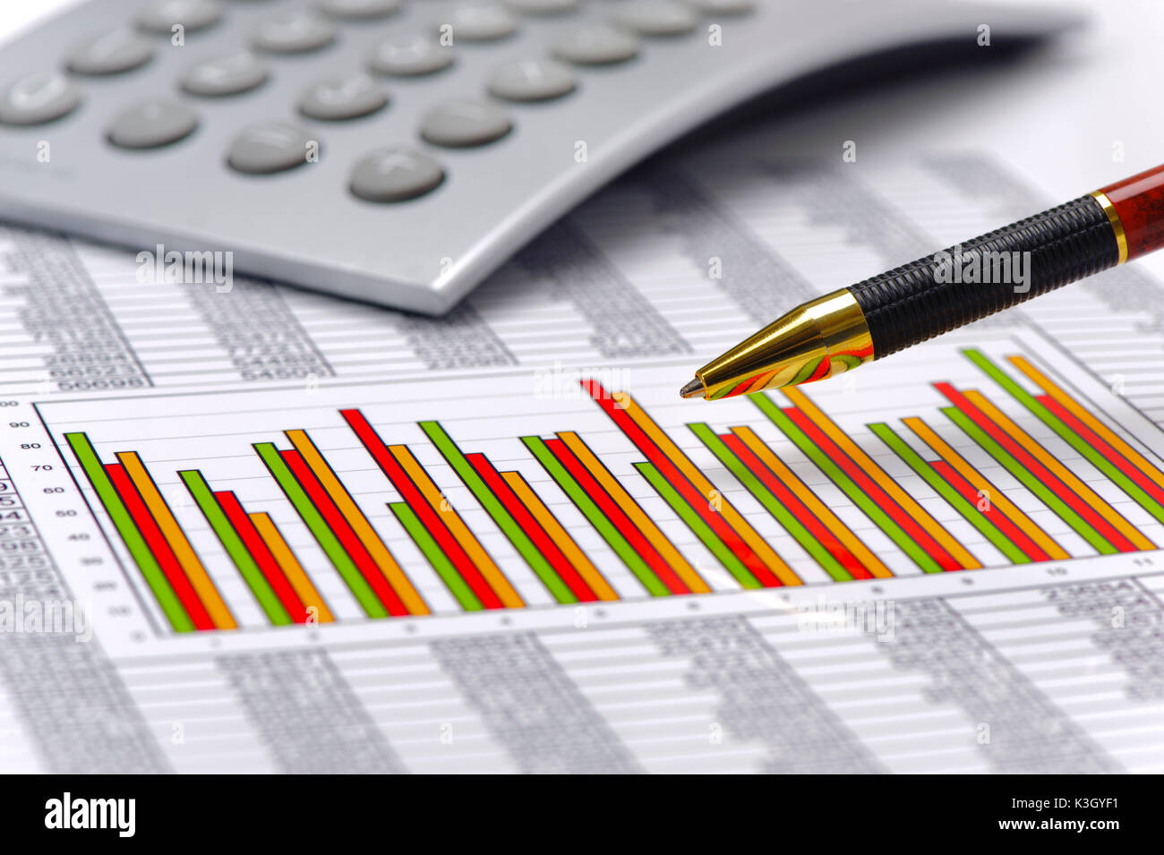 Finances with chart, number table and electronic calculator Stock Photo