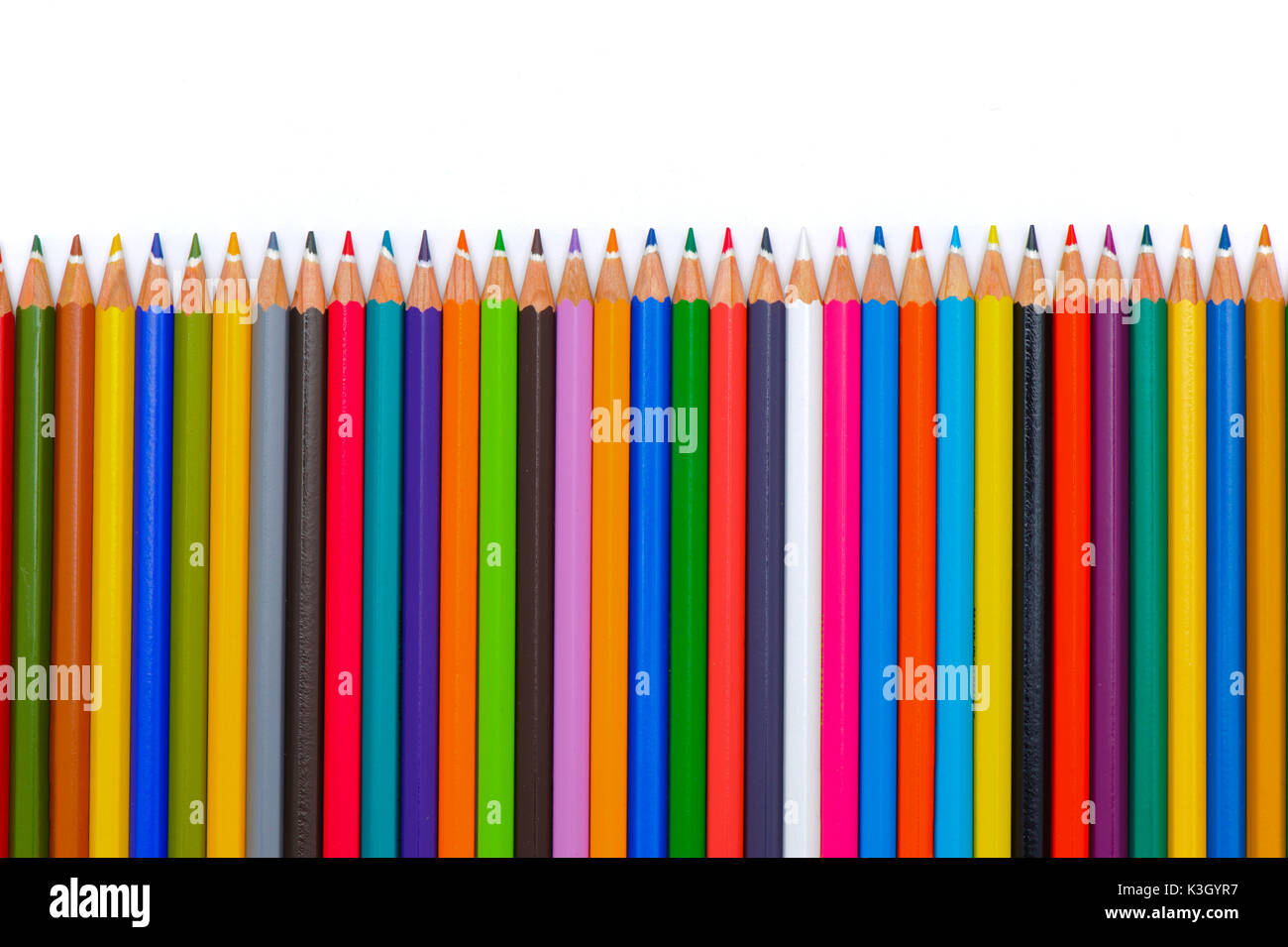 Series of coloured pencils in line close all rainbow colours Stock Photo