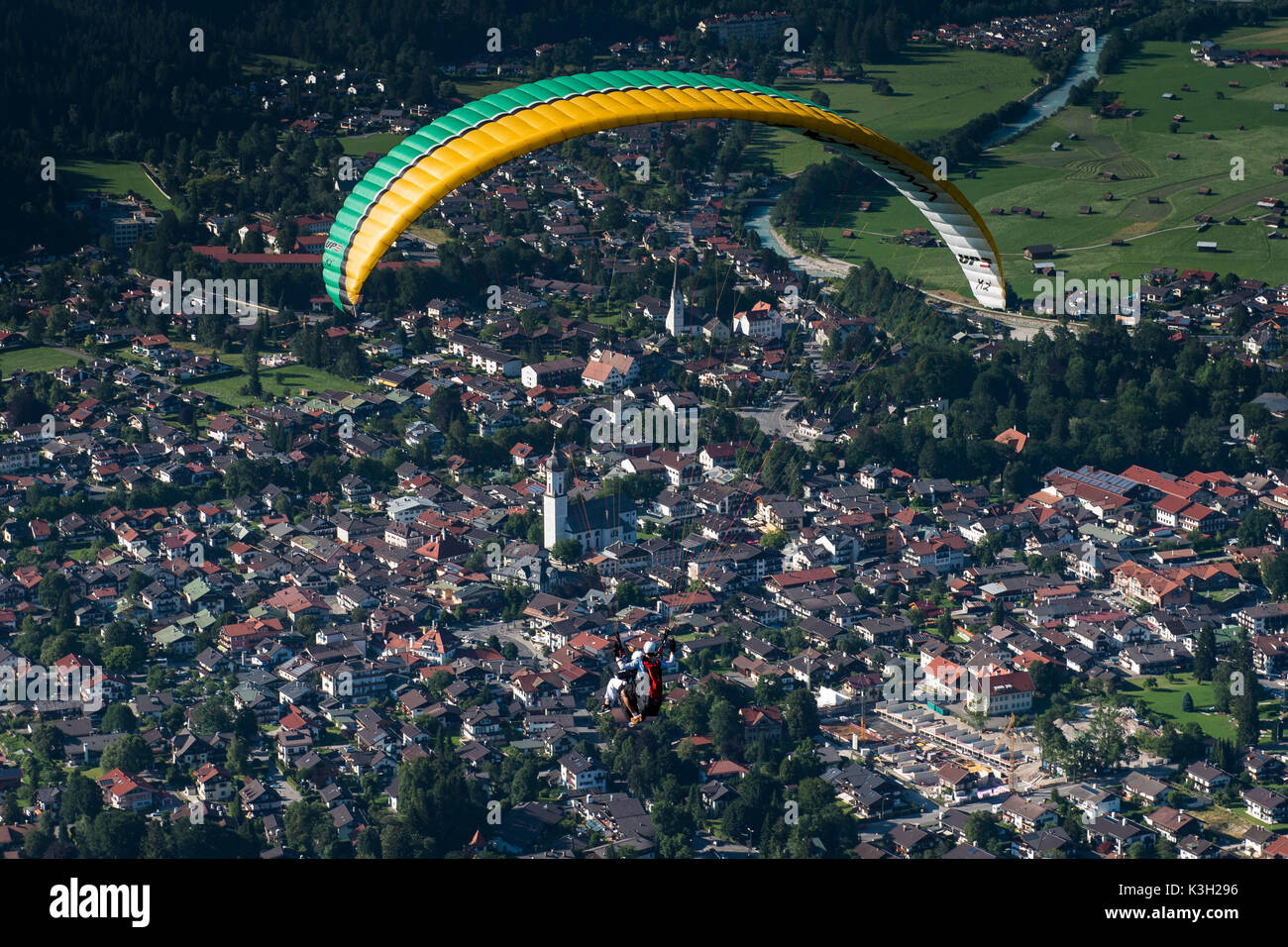 Paraglider over Garmisch-Partenkirchen, aerial picture, tandem flight, Germany, Bavaria, Upper Bavaria, Bavarian alps, Werdenfelser Land Stock Photo