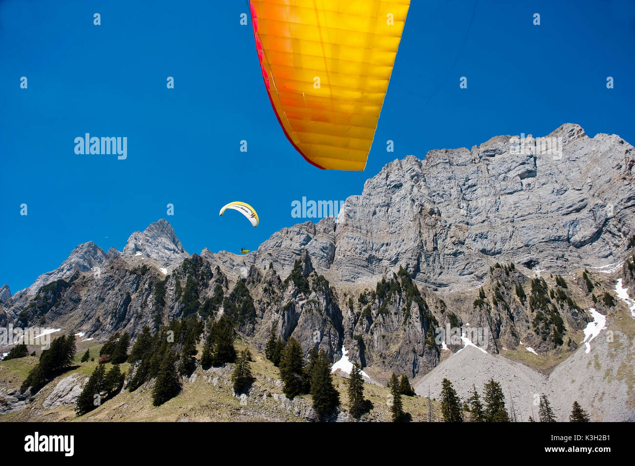 Paraglider in front of Chur ridges, Walensee, aerial picture, canton St. Gallen, Switzerland Stock Photo
