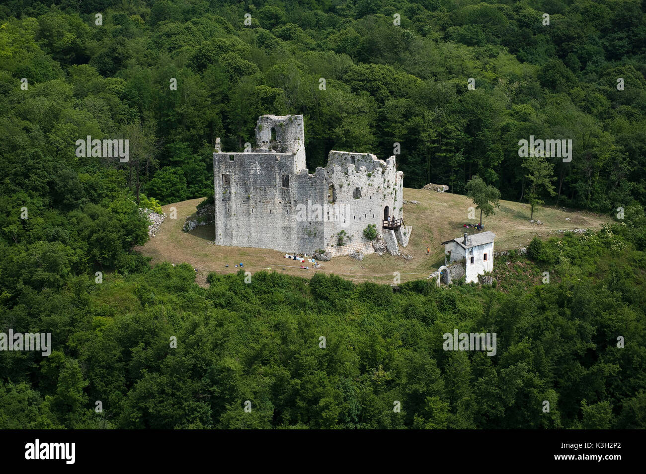Meduno, castle ruin at the mountain wood, aerial picture, Veneto, Italy Stock Photo