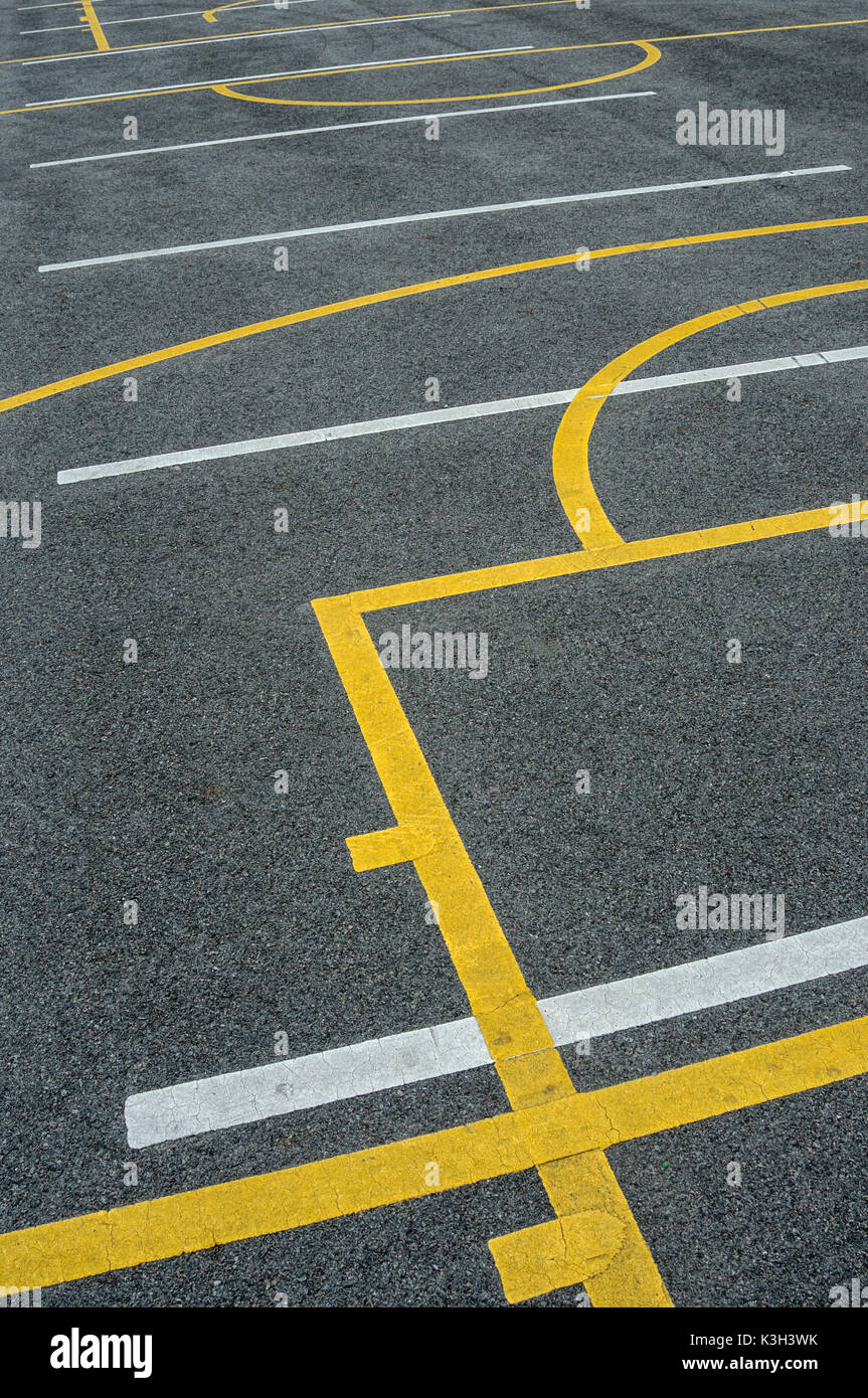 Symbol / Concepts, Partitioning on asphalt with white and yellow lines Stock Photo