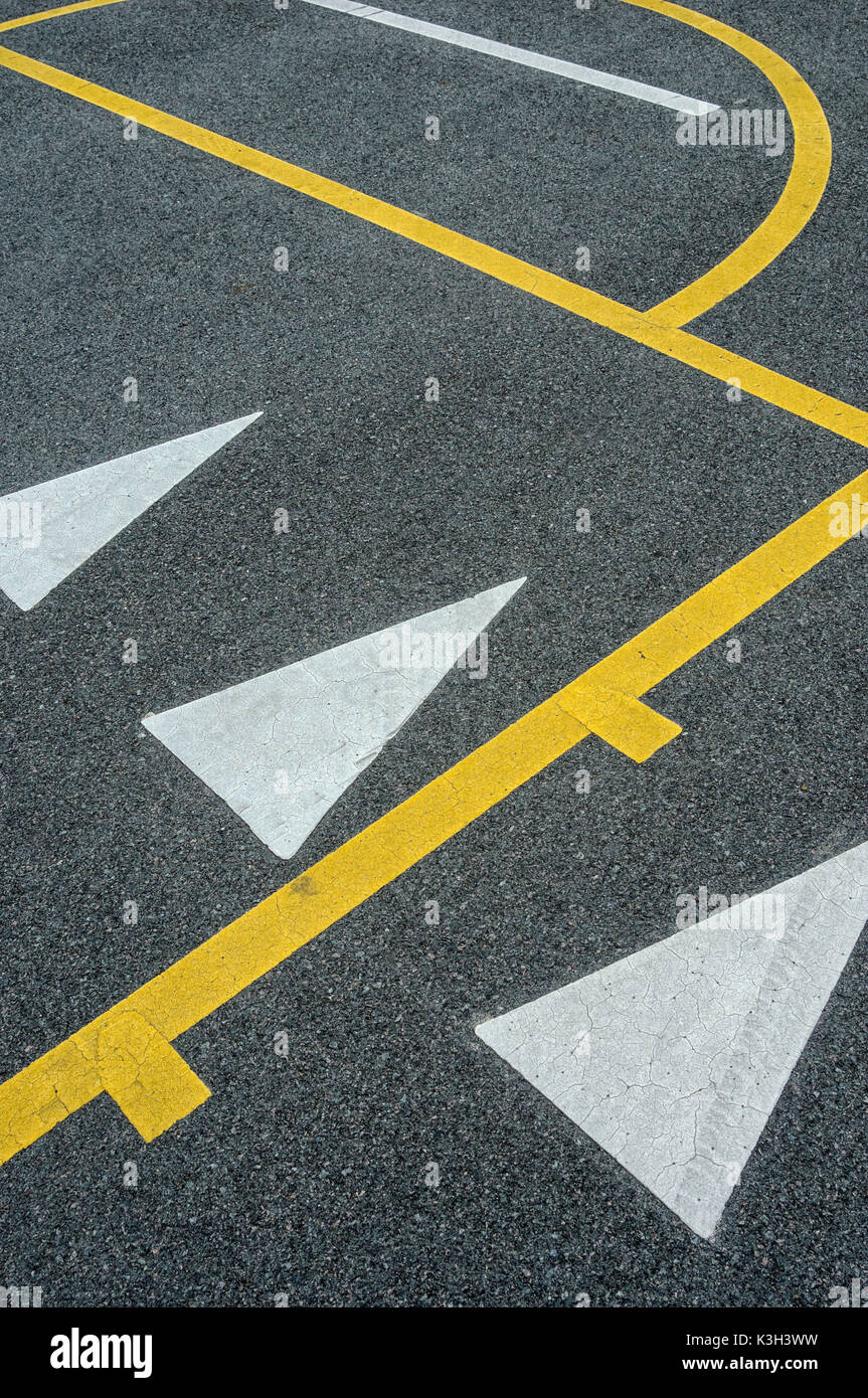 Symbol / Concepts, Partitioning on asphalt with white and yellow lines Stock Photo