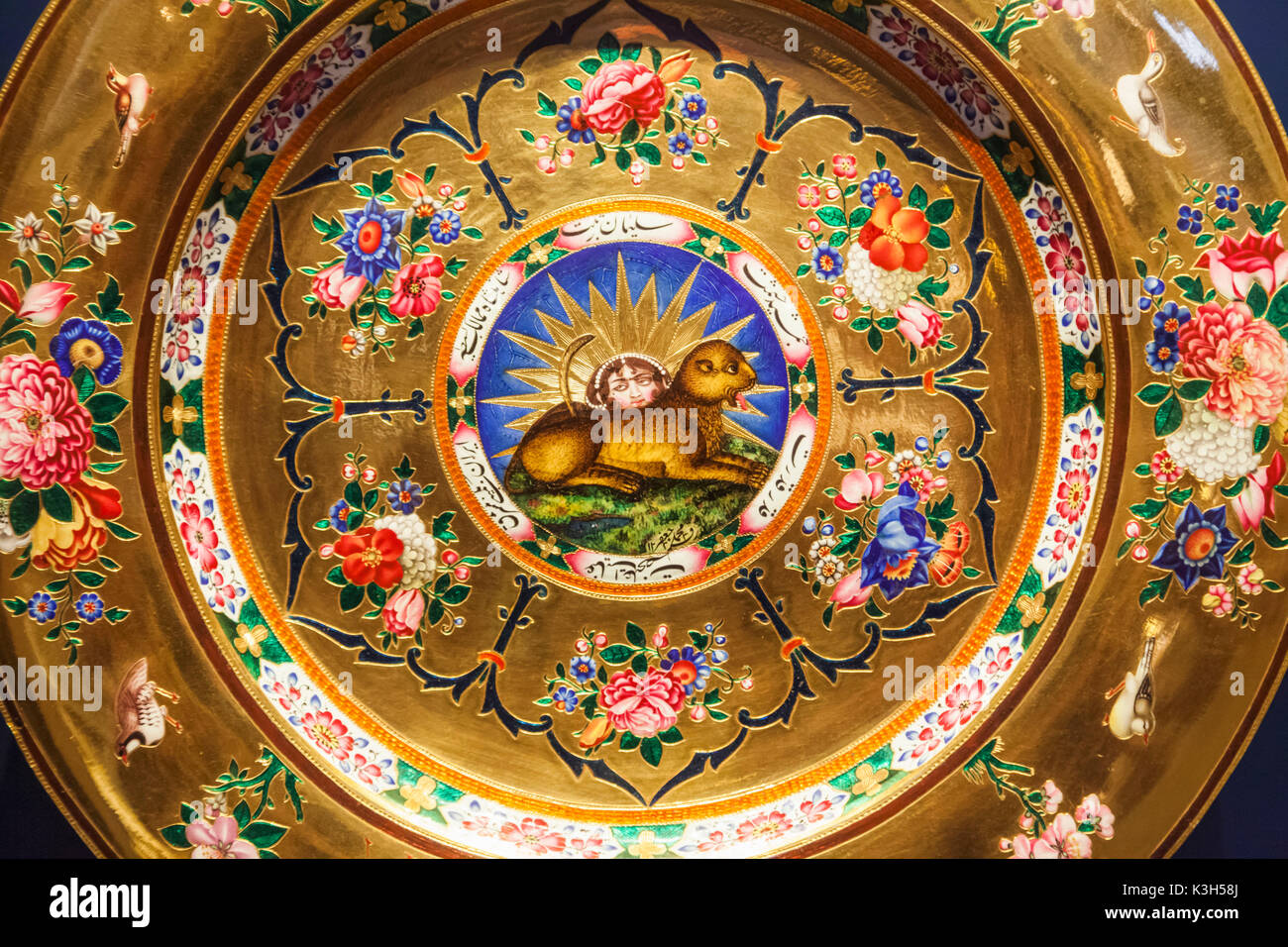 England, London, Kensington, Victoria and Albert Museum aka V&A, The Islamic Middle East Room, Enamelled Gold Dish from Iran dated 1817 Stock Photo