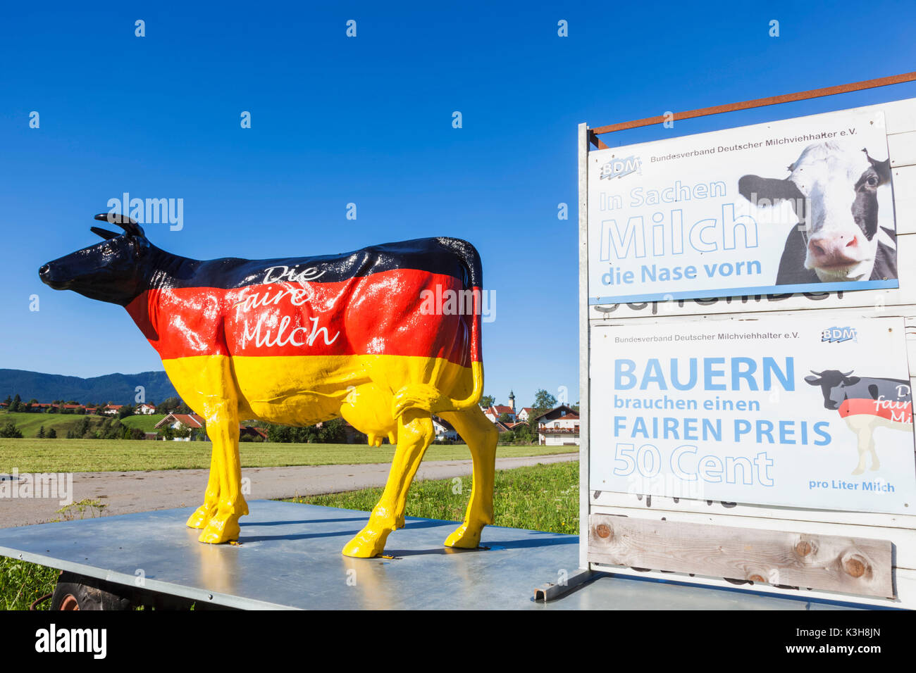 Germany, Bavaria, Farmer's Information Board Demanding Fair Price for Milk Stock Photo