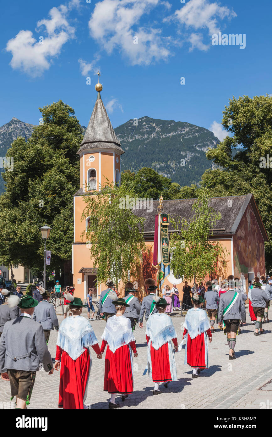 Group in traditional costume marching and church hi-res stock ...