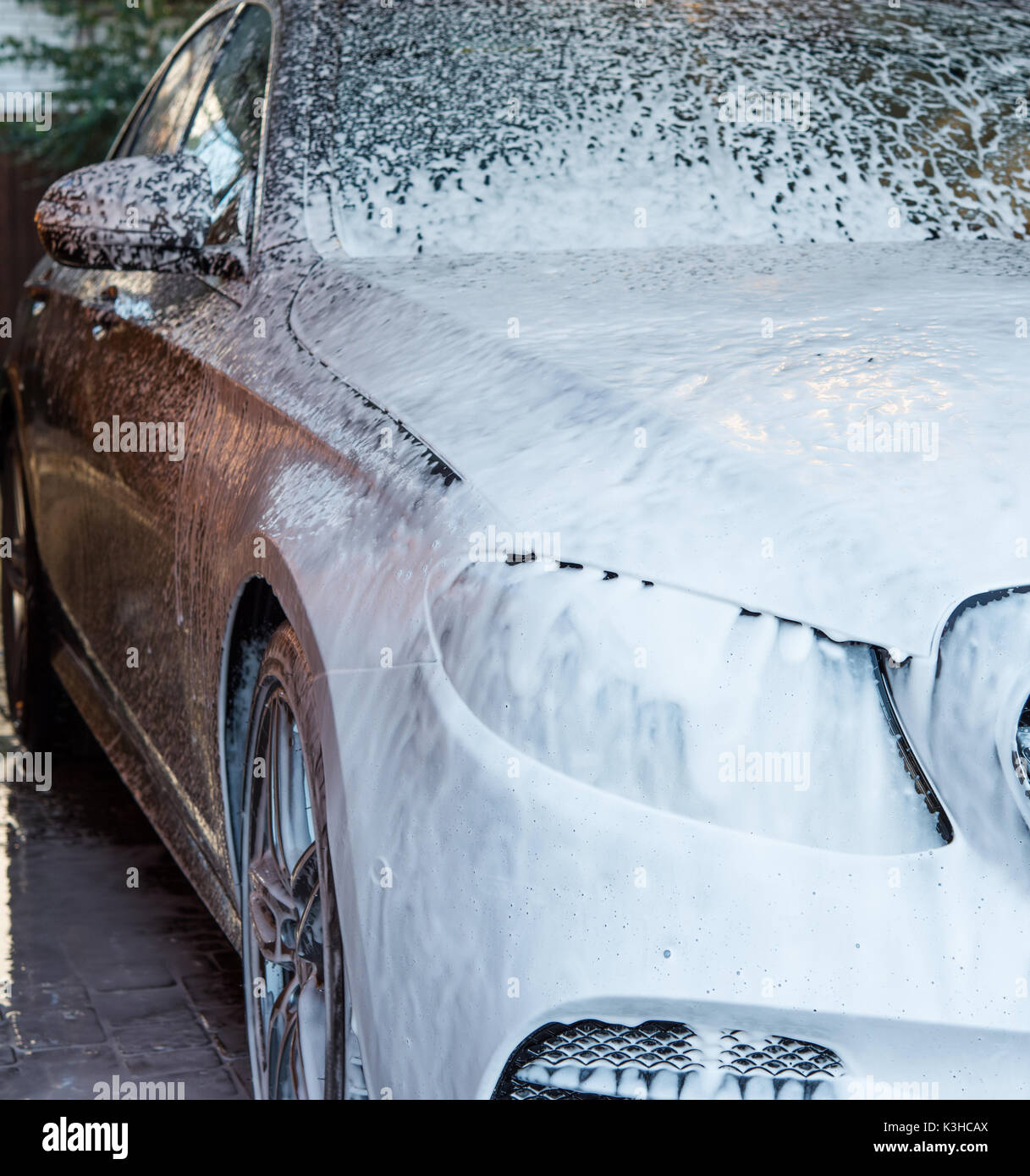 washing the car with foam Stock Photo Alamy