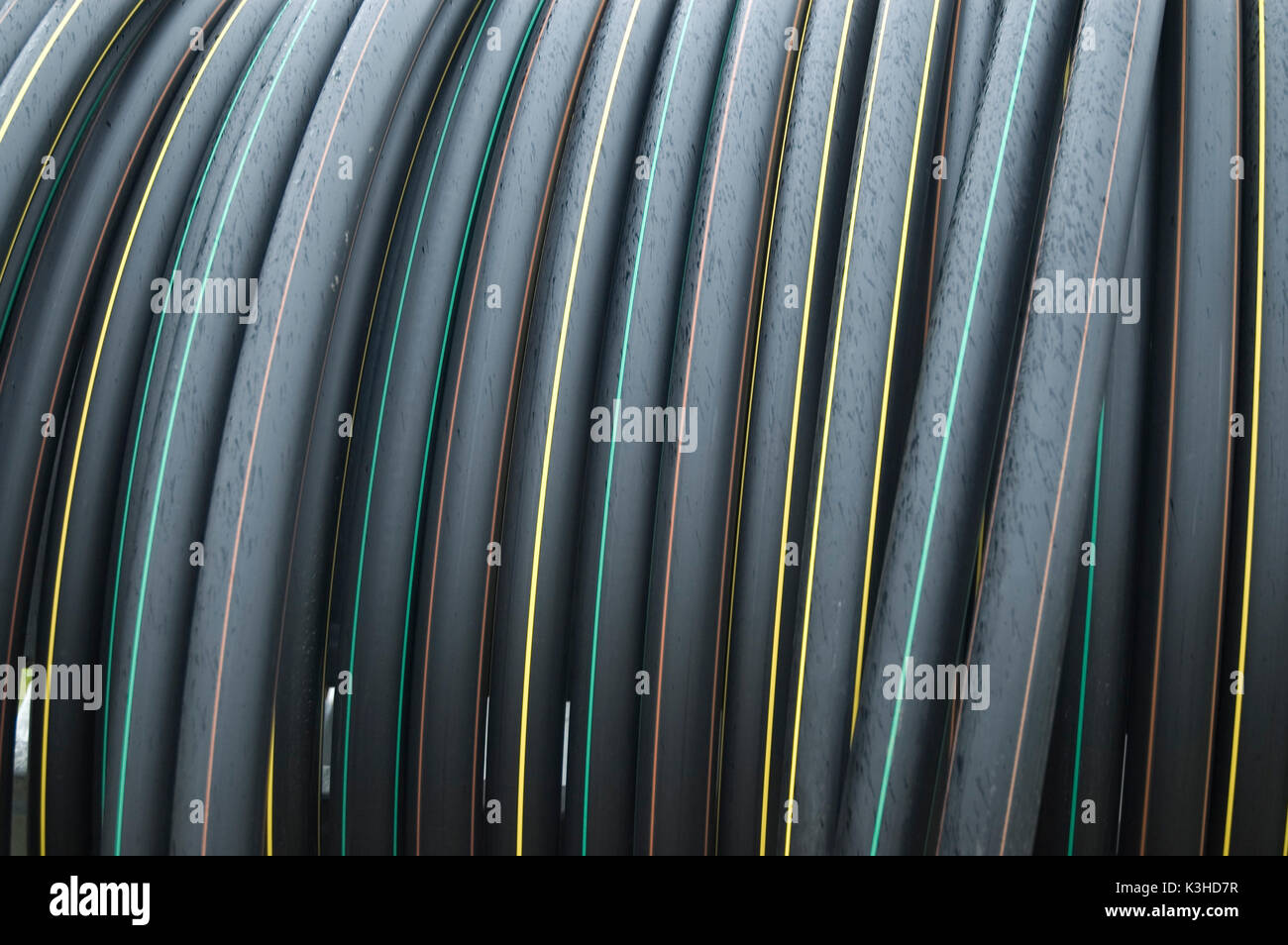 coiled black plastic hoses Stock Photo Alamy
