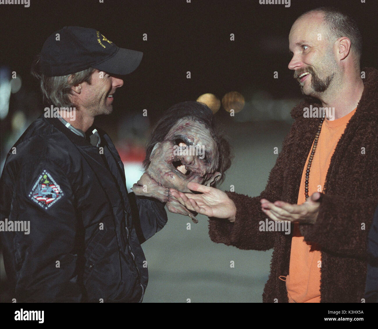 THE TEXAS CHAINSAW MASSACRE  Producer MICHAEL BAY, Director MARCUS NISPEL with the Leatherface mask     Date: 2003 Stock Photo