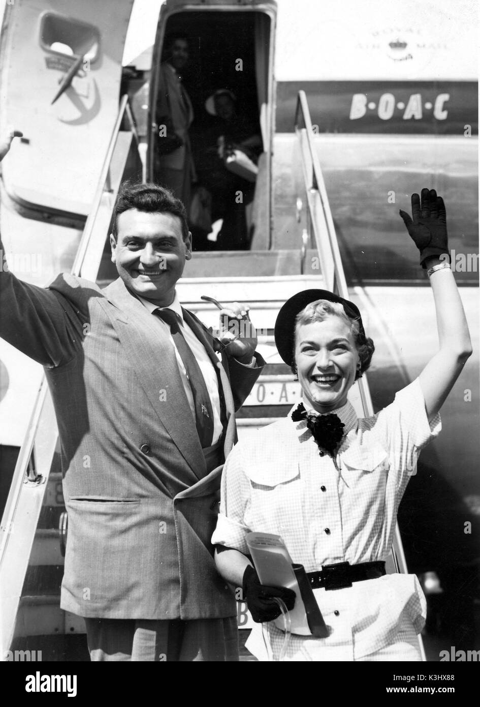 FRANKIE LAINE Singer and actor, seen here arriving in Britain with his wife , actress NAN GREY Stock Photo