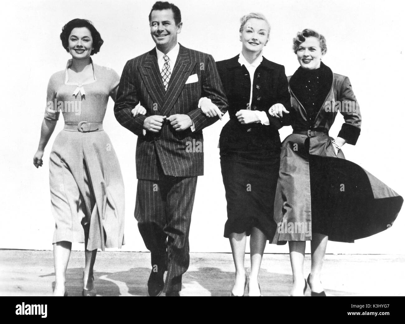 YOUNG MAN WITH IDEAS YOUNG MAN WITH IDEAS from left - RUTH ROMAN, GLENN FORD, NINA FOCH, DENISE DARCEL Stock Photo