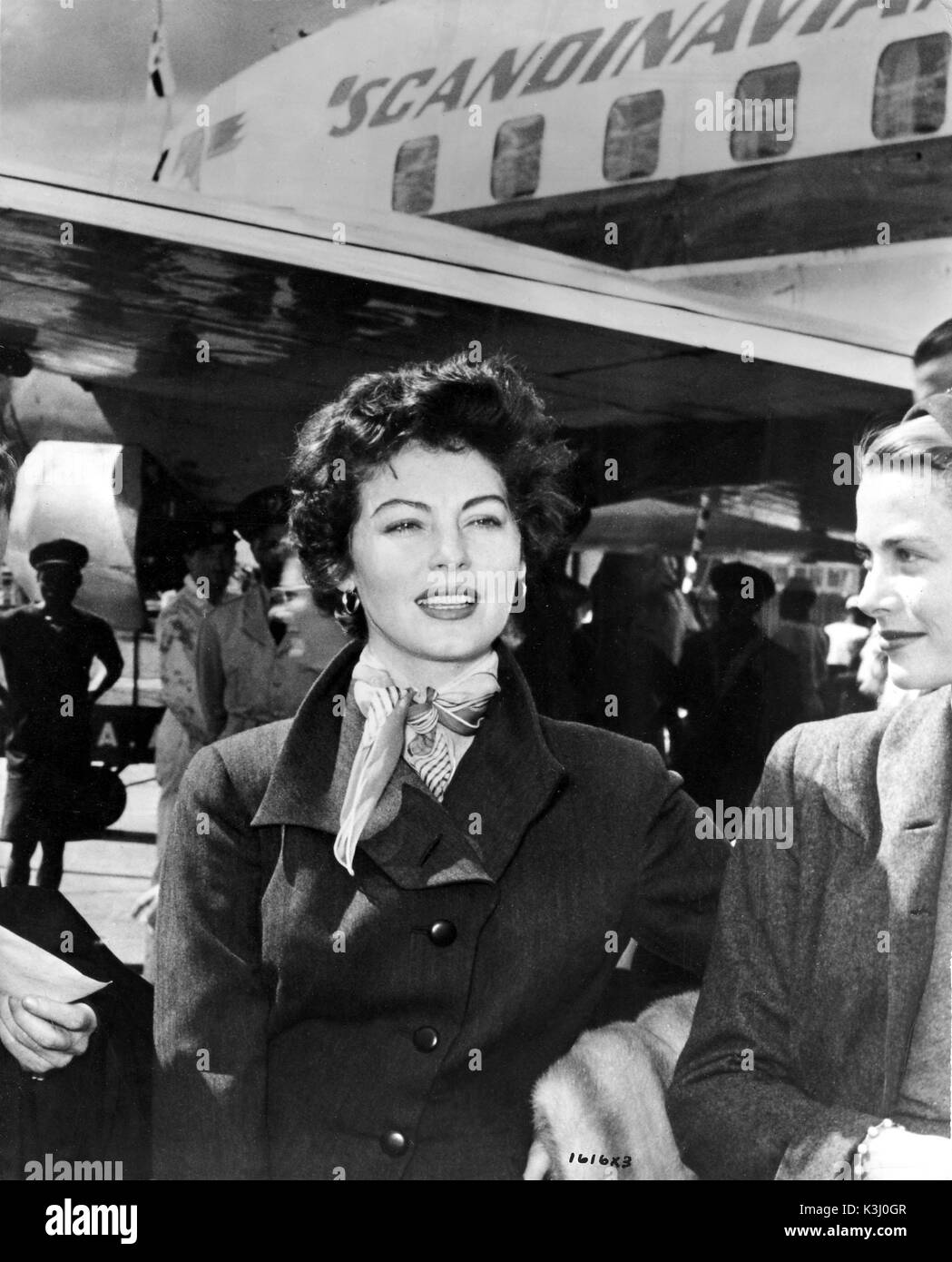 AVA GARDNER American Actress with GRACE KELLY arriving at Nairobi airport to film MOGAMBO [1953] Stock Photo