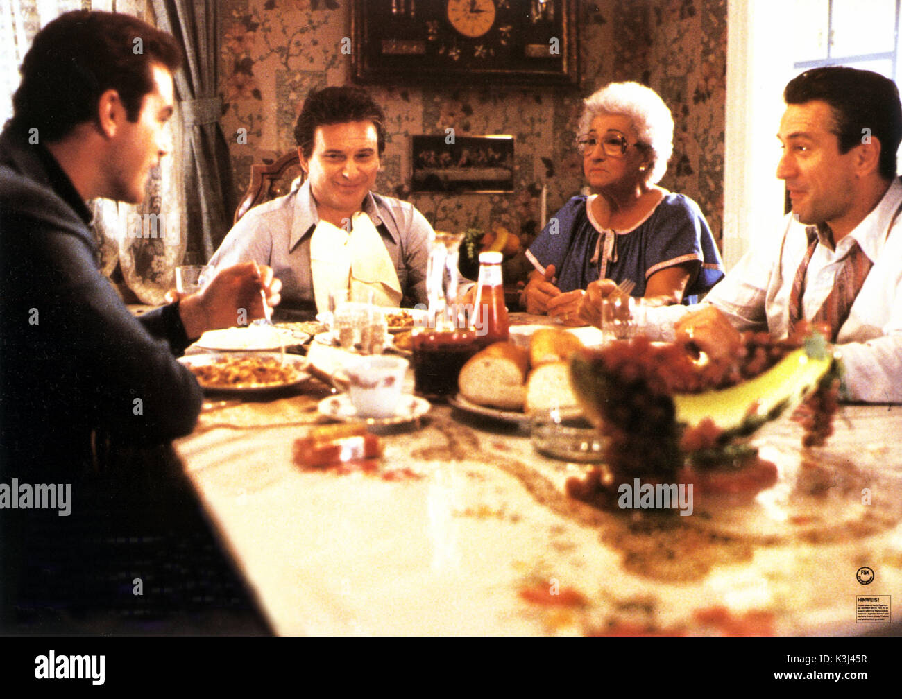 GOODFELLAS [US 1993]  [L-R] RAY LIOTTA as Henry Hill,  JOE PESCI as Tommy DeVito,  [? possibly] CATHERINE SCORSESE as credited as Tommy's mother,  ROBERT DENIRO as Jimmy Conway Stock Photo