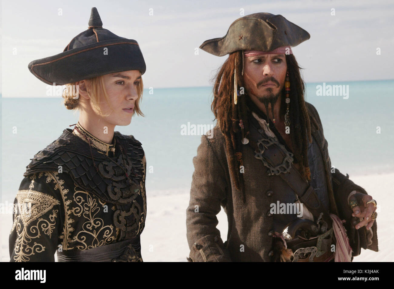 Pictured L-R: Elizabeth Swan (Keira Knightley) and Captain Jack Sparrow (Johnny Depp), in a scene from PIRATES OF THE CARIBBEAN: AT WORLD'S END, directed by Gore Verbinski and produced by Jerry Bruckheimer, from a screenplay written by Ted Elliott & Terry Rossio. PIRATES OF THE CARIBBEAN: AT WORLD'S END [US 2007]  aka PIRATES OF THE CARIBBEAN 3  KEIRA KNIGHTLEY as Elizabeth Swan,  JOHNNY DEPP as Captain Jack Sparrow    Pictured L-R: Elizabeth Swan (Keira Knightley) and Captain Jack Sparrow (Johnny Depp), in a scene from PIRATES OF THE CARIBBEAN: AT WORLD'S END, directed by Gore Verbinski a Stock Photo