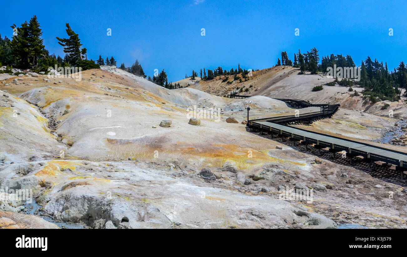 Boardwalk at Bumpass Hell, Lassen Volcanic National Park, USA. This is the largest hydrothermal area in the park, and the main area of upflow of steam Stock Photo