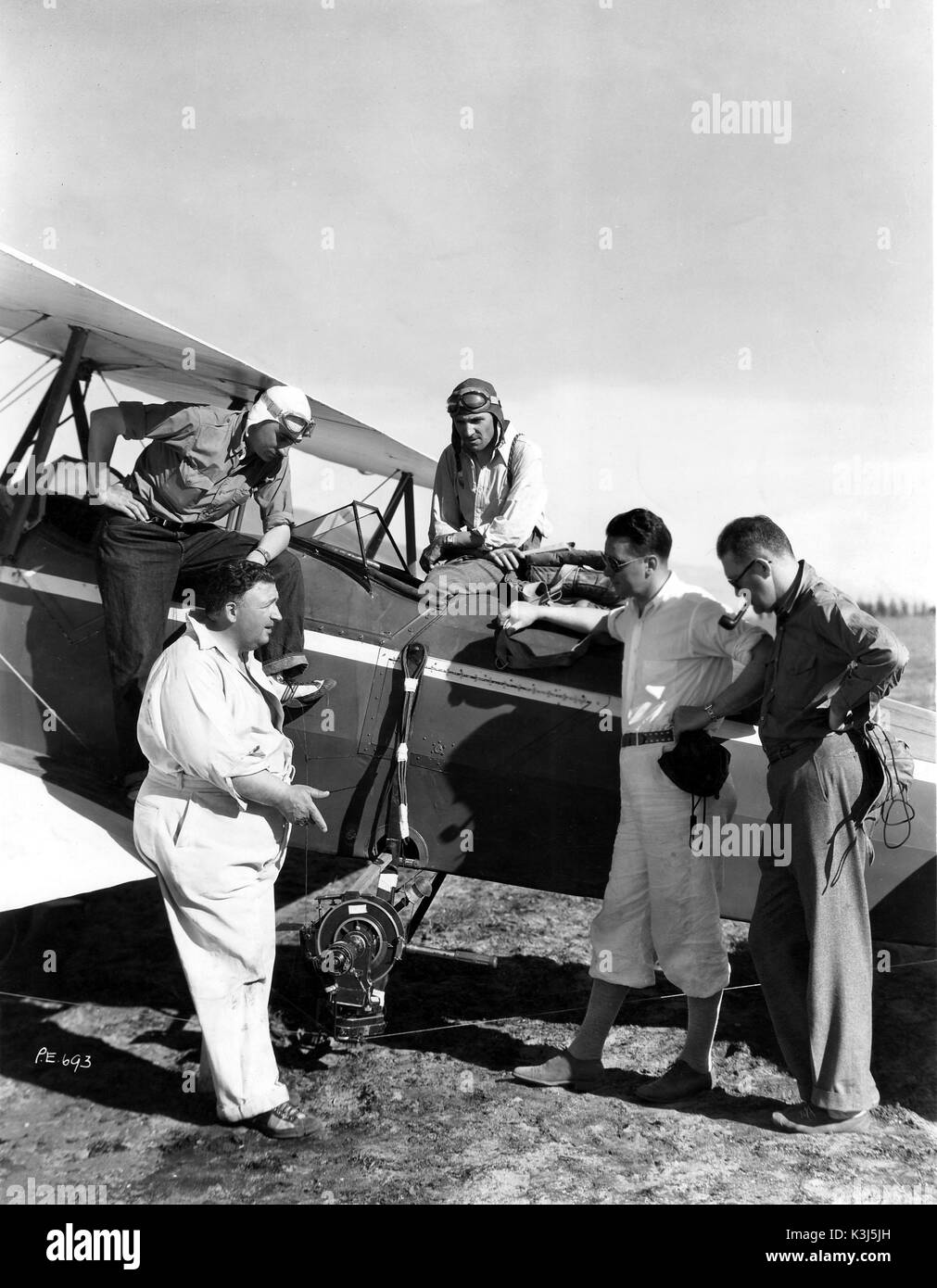 AIRMAIL L-R, Director JOHN FORD, stunt pilots JIMMY JAMES, PAUL NANSE, ELMER DYER Cameraman, KARL FREUN Stock Photo