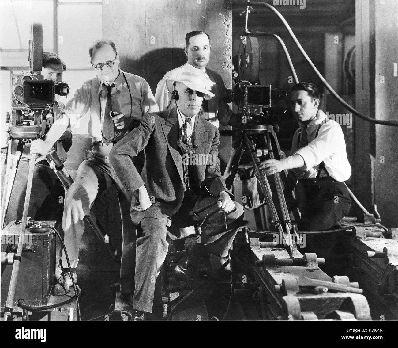D. W. GRIFFITH Film Director D. W. GRIFFITH [centre] [1875 - 1948] Film Director Stock Photo