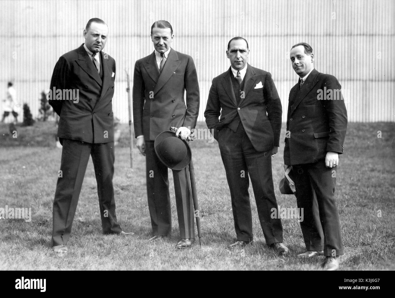 ELSTREE STUDIOS, the base of BRITISH INTERNATIONAL PICTURES is visited by famous film actor CLIVE BROOK also seen are Director / Producer VICTOR SAVILLE , and J A THORPE the studio General Manager and JOE GROSSMAN Studio Manager Stock Photo