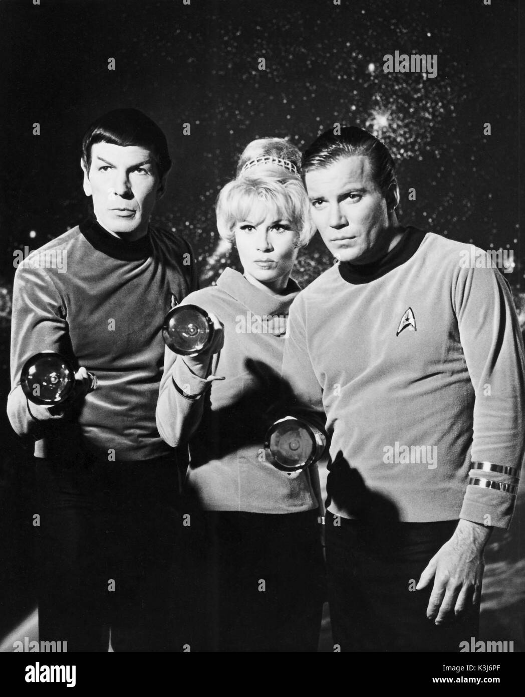 STAR TREK LEONARD NIMOY as Mr. Spock, GRACE LEE WHITNEY as Yeoman Rand, WILLIAM SHATNER as Captain James Kirk STAR TREK Stock Photo