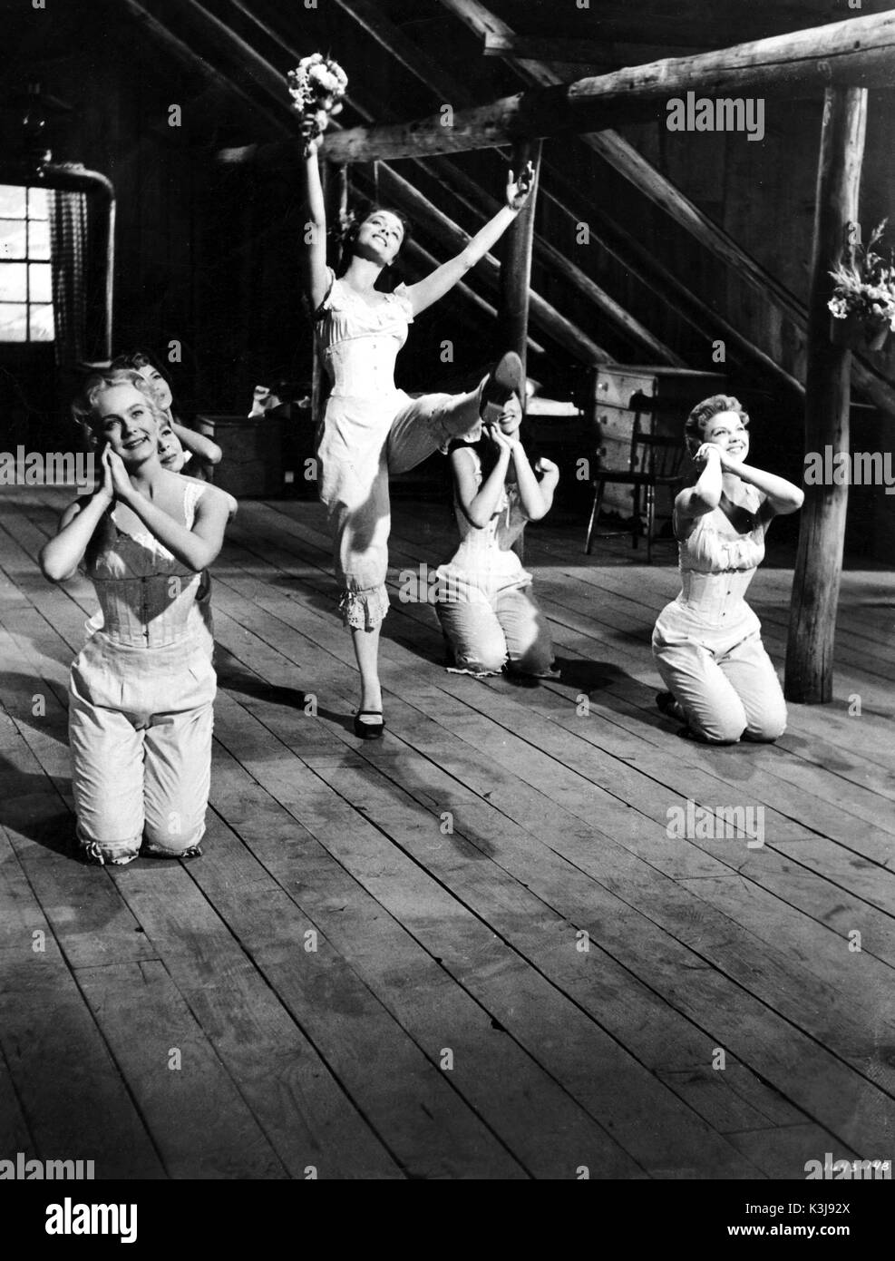 SEVEN BRIDES FOR SEVEN BROTHERS  NANCY KILGAS, BETTY CARR [partially concealed middle], RUTA LEE [partially concealed top], VIRGINIA GIBSON [standing], JULIE NEWMAR [behind foot], NORMA DOGGETT Stock Photo
