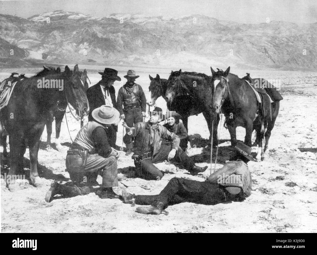 YELLOW SKY CHARLES KEMPER [back to camera], RICHARD WIDMARK, HARRY MORGAN [aka HENRY MORGAN], GREGORY PECK, ROBERT ARTHUR, JOHN RUSSELL Stock Photo