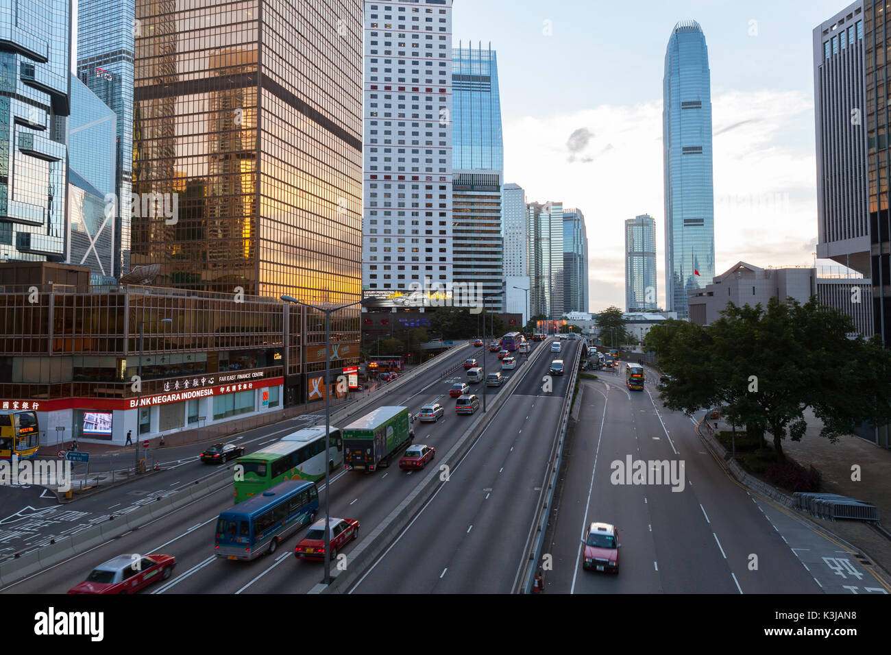 Hong Kong - July 11, 2017: Street view of Hong Kong city center. Connaught Rd Central perspective with IFC mall Stock Photo