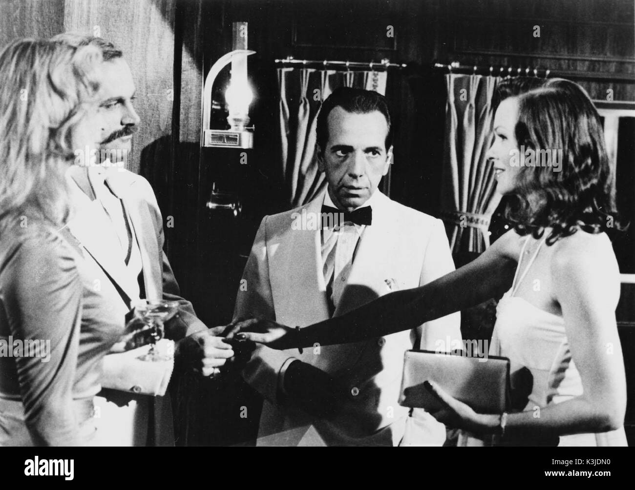 THE MAN WITH BOGART'S FACE [US 1980] MICHELLE PHILLIPS, FRANCO NERO, ROBERT SACCHI, SYBIL DANNING     Date: 1980 Stock Photo