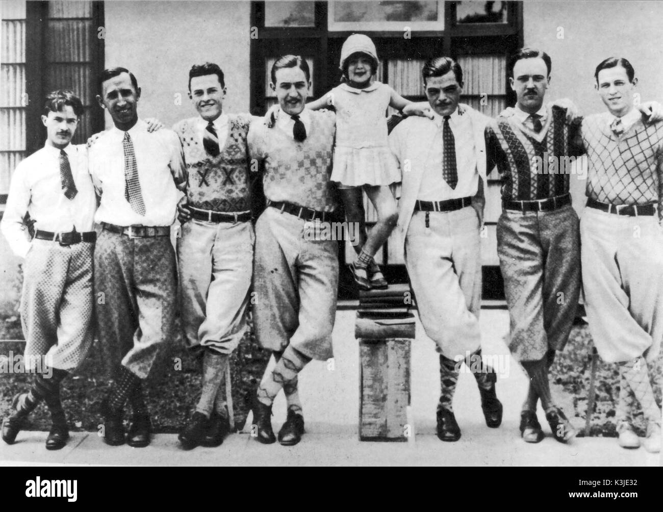 WALT DISNEY and his animators in either late 1926 or early 1927, when they were working on the Alice series of cartoons. HAM HAMILTON, ROY O. DISNEY, HUGH HARMAN, WALT DISNEY, MARGIE GAY who played Alice, RUDOLPH ISING, UB IWERKS, WALKER HARMAN WALT DISNEY and his animators in either late 1926 or early 1927, when they were working on the Alice series of cartoons. Stock Photo