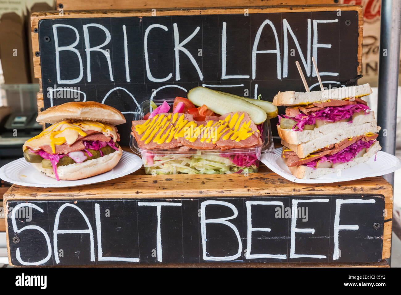 England, London, Shoreditch, Brick Lane, Street Food Stall Display of Salt Beef Sandwiches Stock Photo