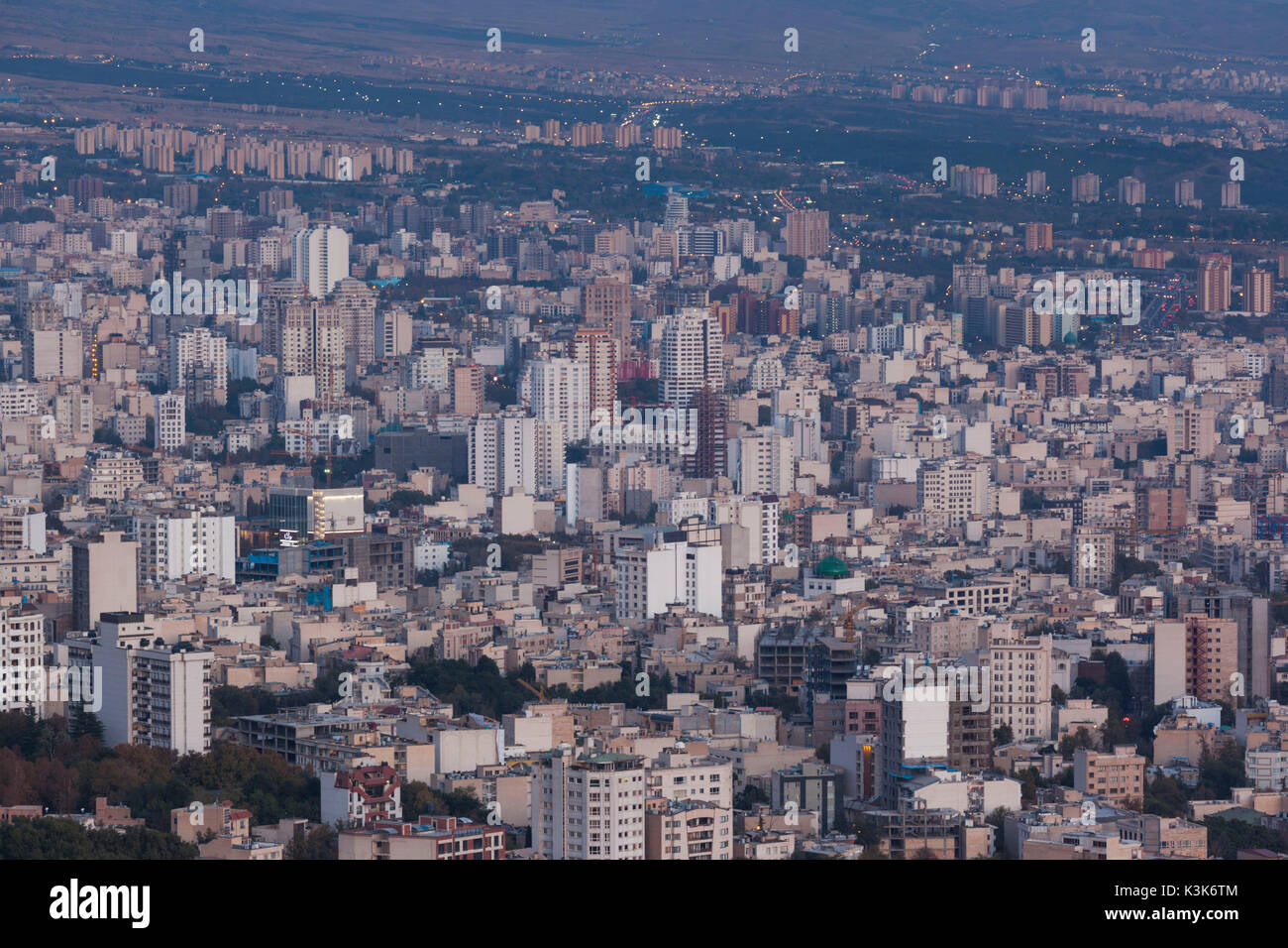 Iran, Tehran, elevated city skyline from the Roof of Iran Park, dusk