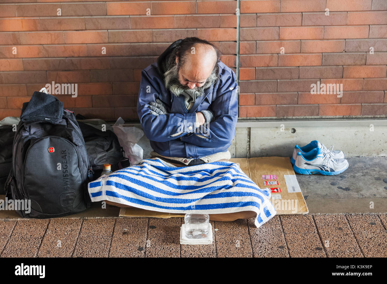 Japan, Hoshu, Tokyo, Akihabara, Homeless Man Begging Stock Photo