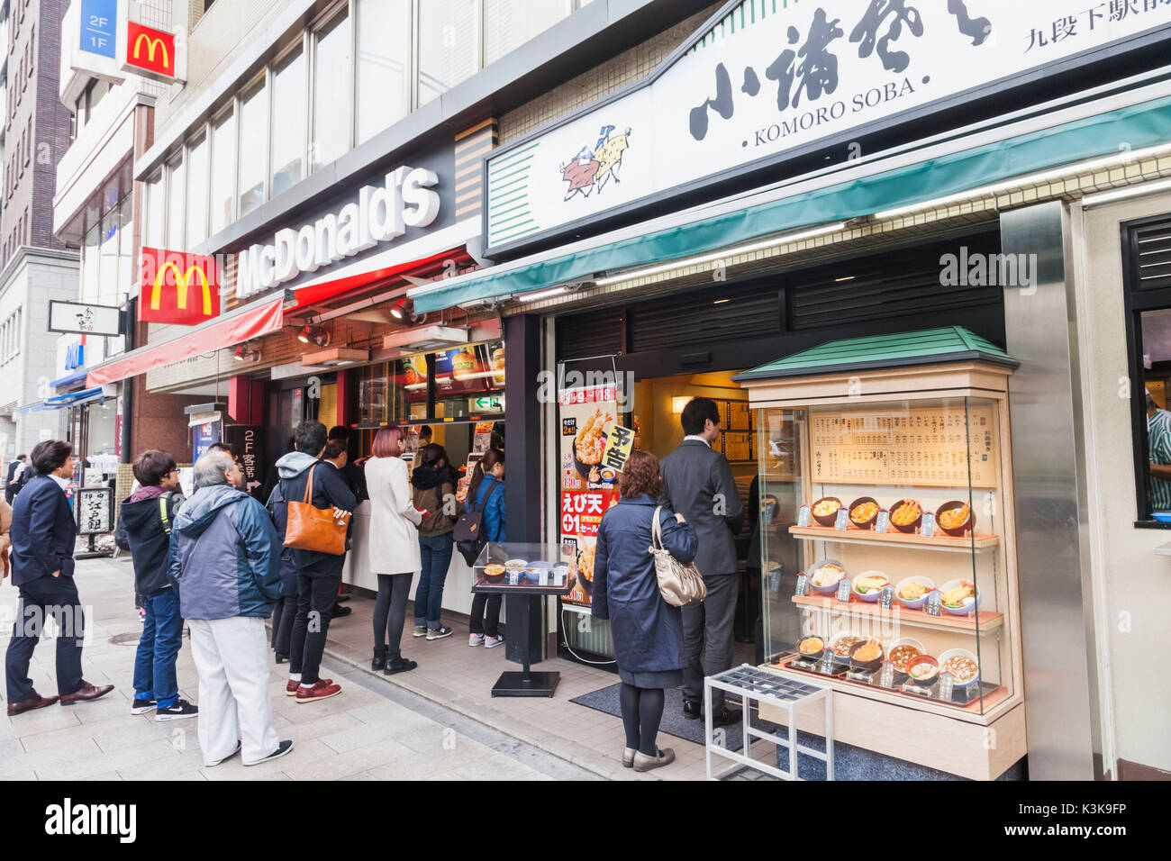 Japan, Honshu, Tokyo, McDonald's and Traditional Japanese Restaurant Stock Photo