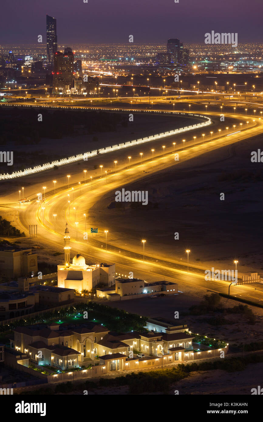 UAE, Dubai, Downtown Dubai, elevated desert and highway view towards Ras Al Khor, dawn Stock Photo