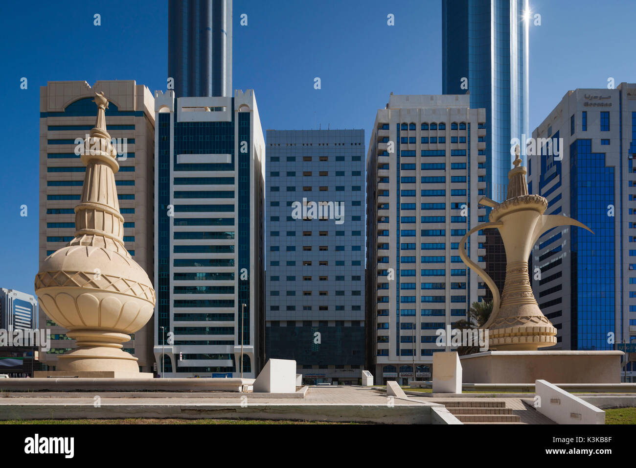UAE, Abu Dhabi, Airport Road and large Arab-themed road sculptures Stock Photo