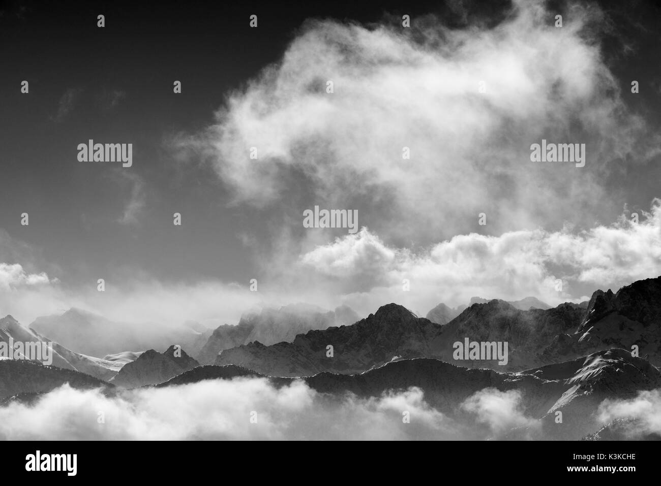 View from the Herzogstand direction high mountains and Soierngruppe. Stock Photo