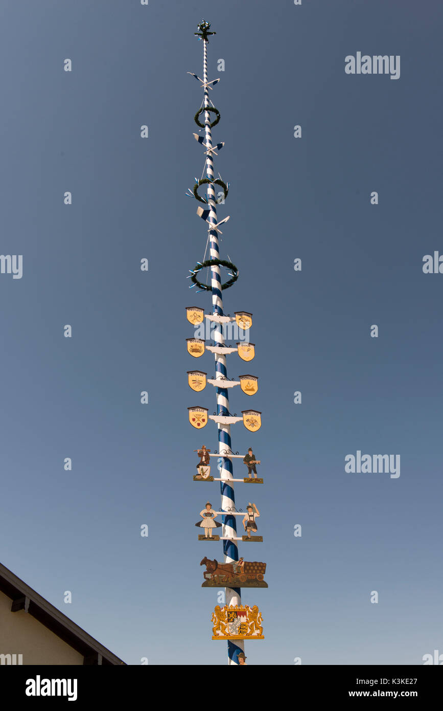 Maypole with guild coat of arms Stock Photo - Alamy