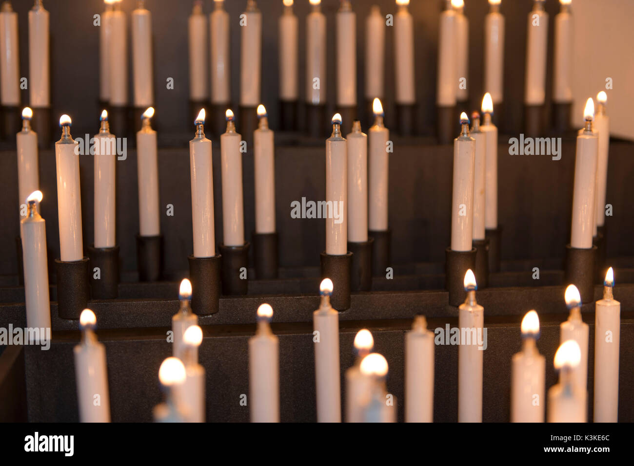 white liquid wax offering candles Stock Photo