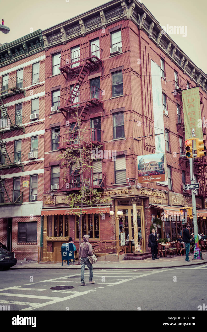 Streetview and a brick House with fire stairs, typical architecture in Little Italy, Manhatten, New York, USA Stock Photo