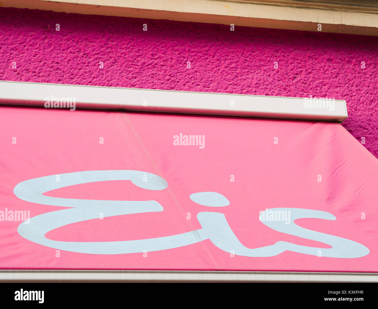 The German Word Eis for Ice Cream On A Pink Awning Stock Photo Alamy