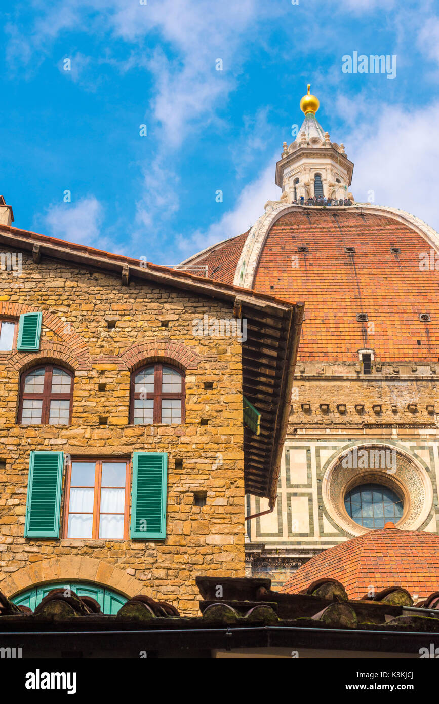 Florence, Tuscany, Italy. Duomo's cupola seen from a city street. Stock Photo