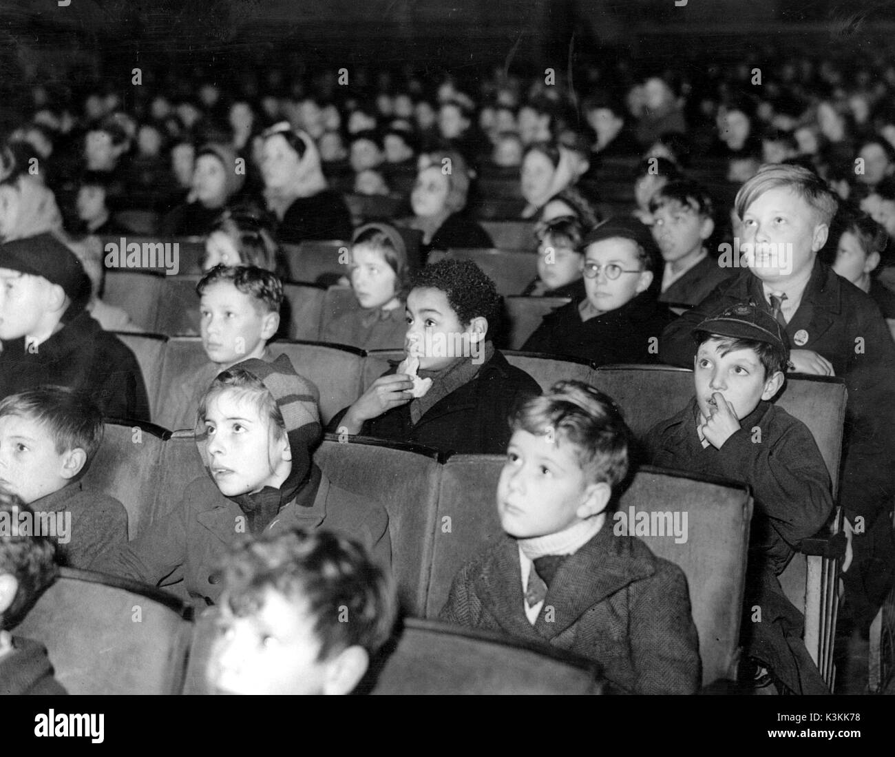 CHILDREN AT SATURDAY MORNING PICTURES Stock Photo