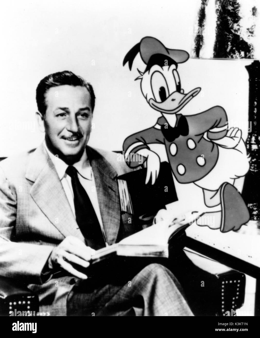 WALT DISNEY American film producer, film executive and animator with Donald Duck Stock Photo