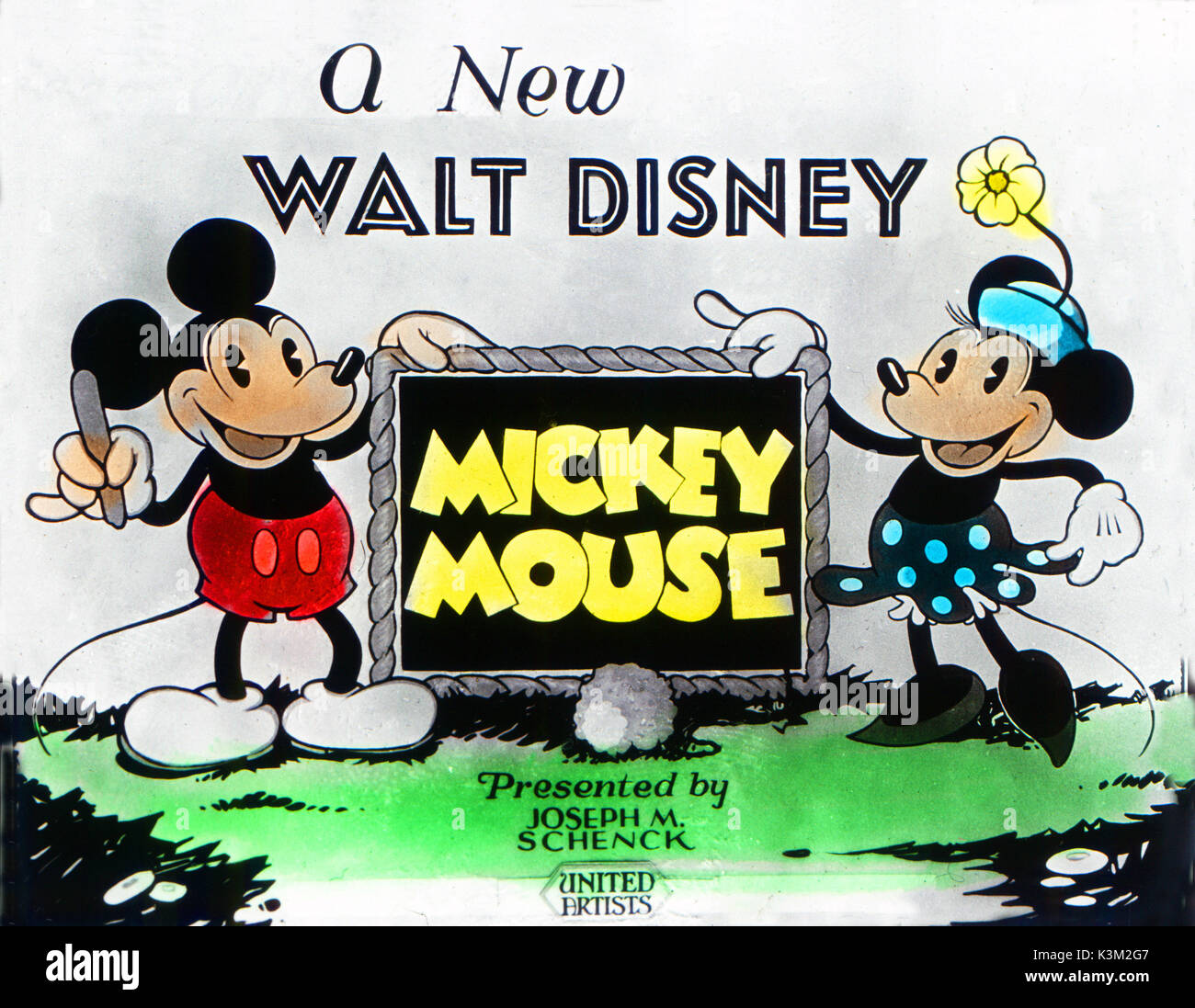Cinema announcement slide advertising A NEW WALT DISNEY MICKEY MOUSE and showing MICKEY MOUSE and MINNIE MOUSE Stock Photo