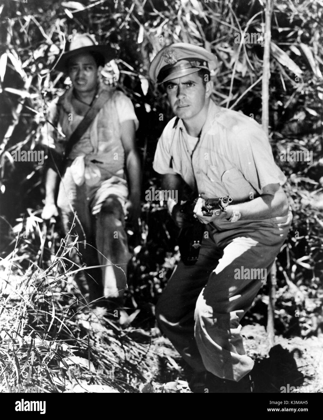 AMERICAN GUERILLA IN THE PHILIPPINES [US 1950]  aka I SHALL RETURN [BR Title] TYRONE POWER [right]     Date: 1950 Stock Photo
