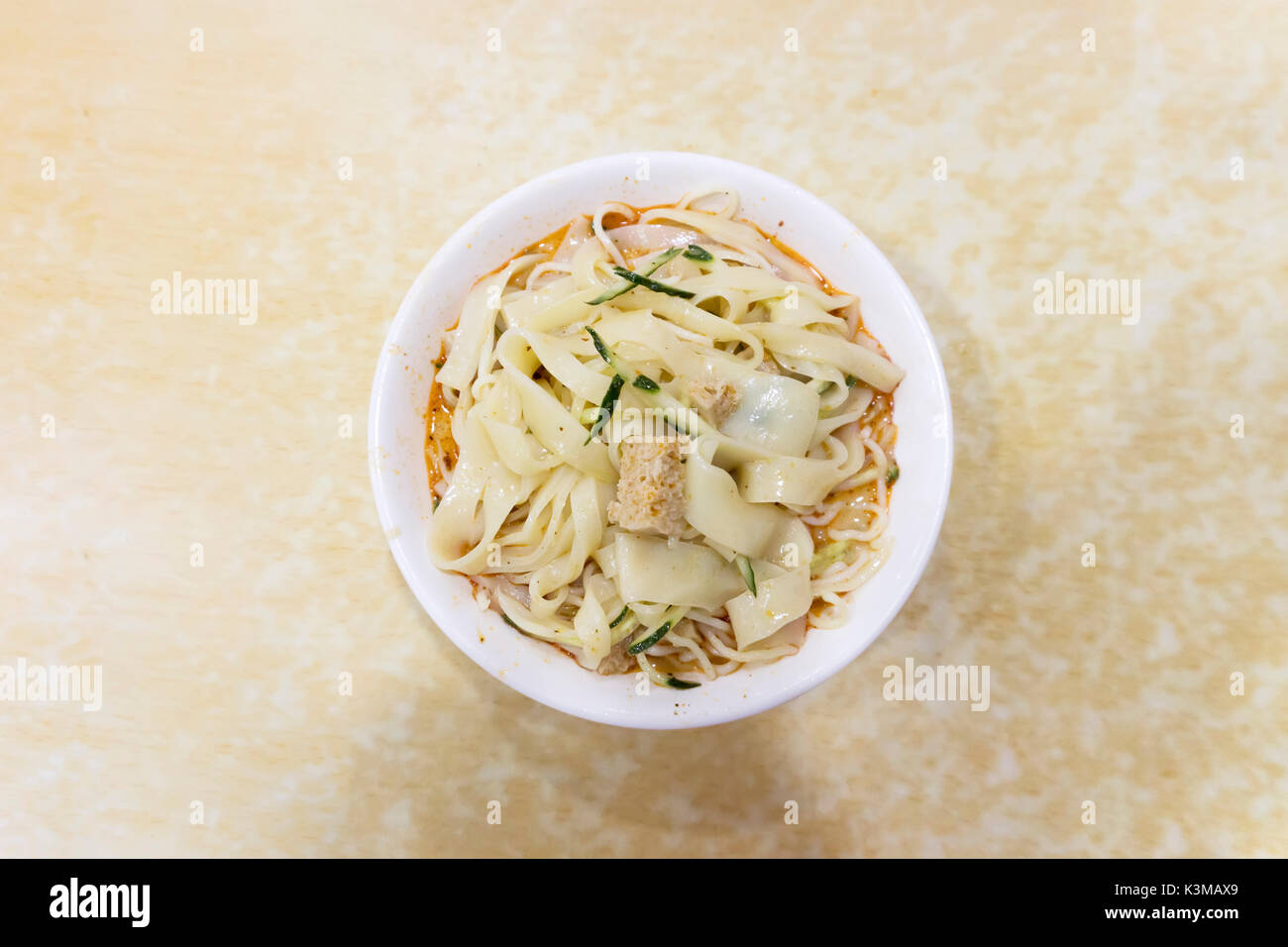 chinese noodles in a red bowl Stock Photo