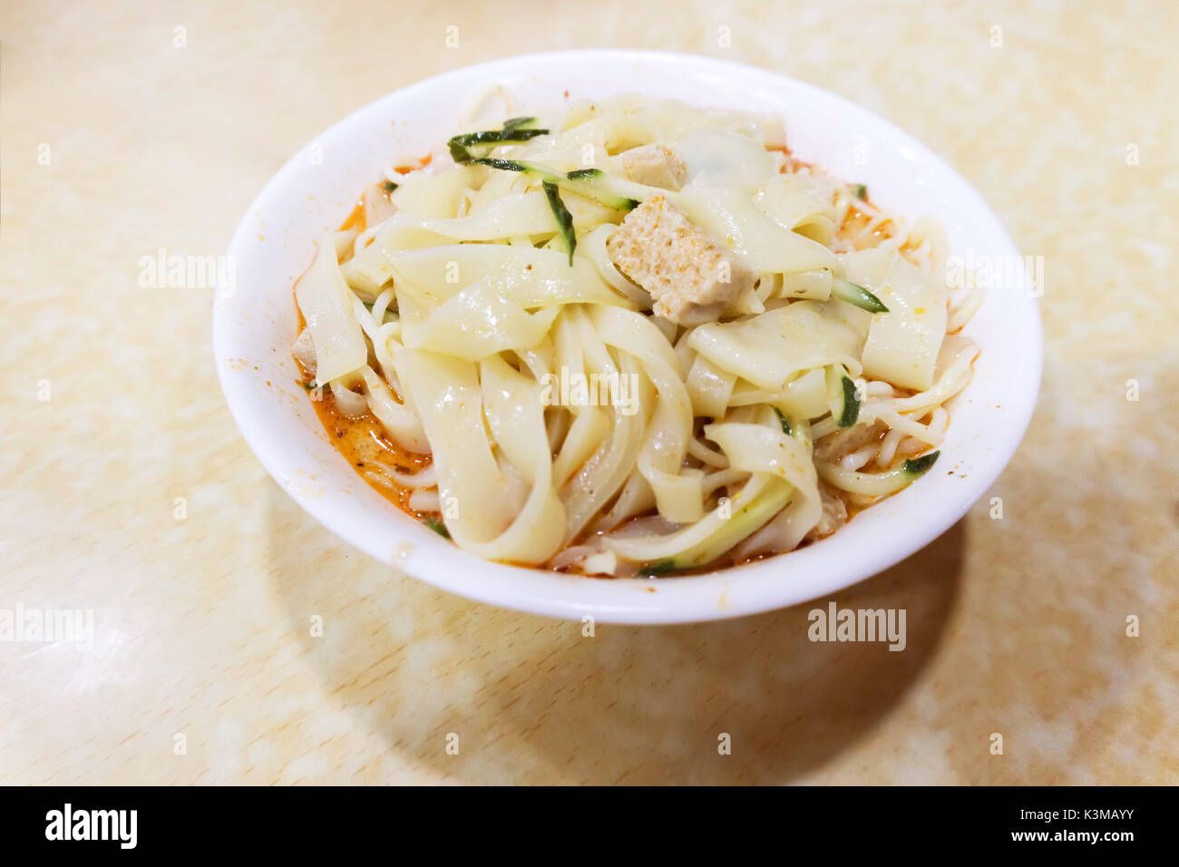 chinese noodles in a red bowl Stock Photo