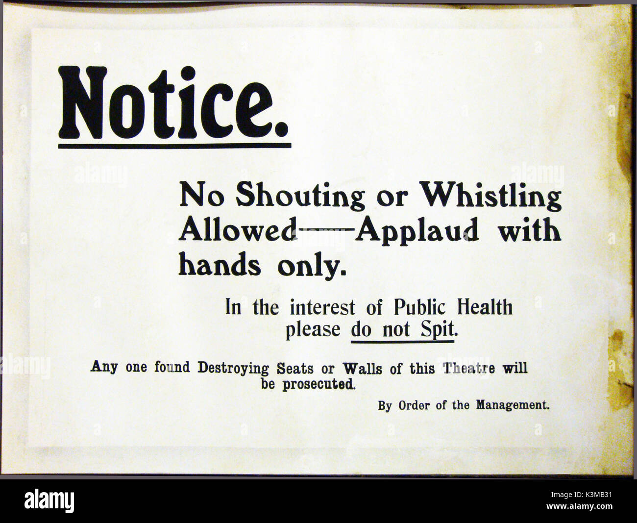 CINEMA NOTICE NO SHOUTING OR WHISTLING ALLOWED - APPLAUD WITH HANDS ONLY. iN THE INTEREST OF PUBLIC HEALTH, PLEASE DO NOT SPIT. This notice was displayed in and years later found in the loft of, the former BERVIE CINEMA, King Street, Inverbervie, a coastal village in Kincardineshire, which has since become part of Aberdeenshire. The main street cinema, in a former boot polish factory, opened in 1914. Closed in 1957 then was reopened for several years. Finally used by the local butcher in which to make pork pies it was completely demolished and housing built on the site. Stock Photo