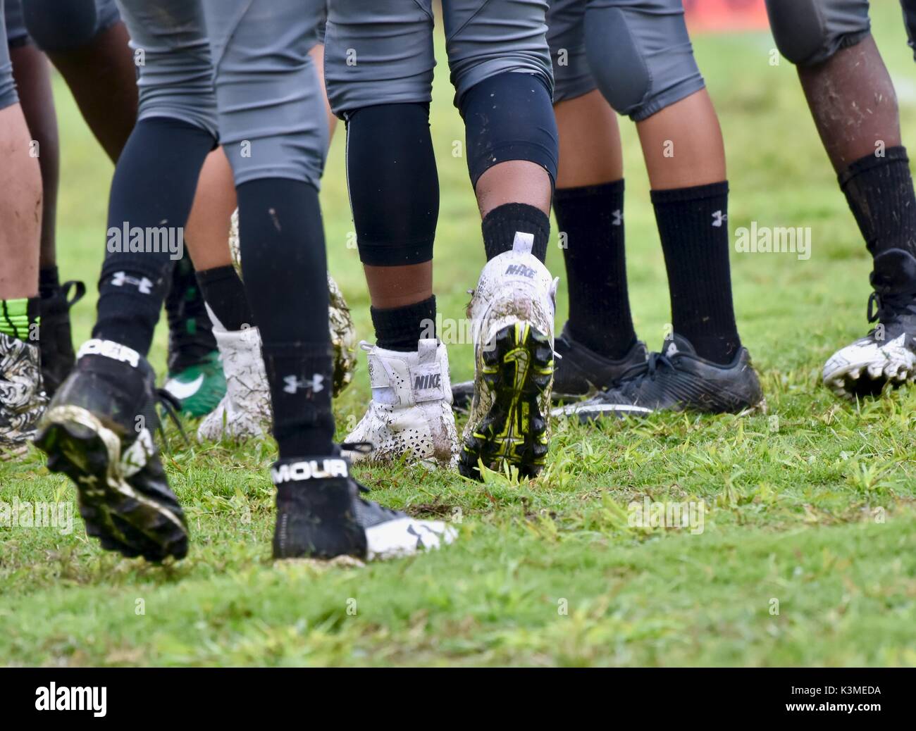 American football players cleats Stock Photo Alamy