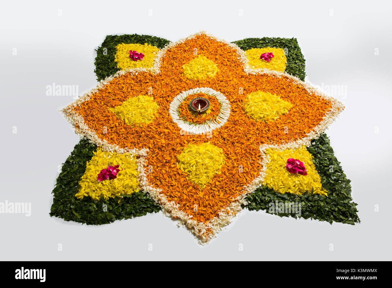 flower rangoli for Diwali or pongal or onam made using marigold or ...